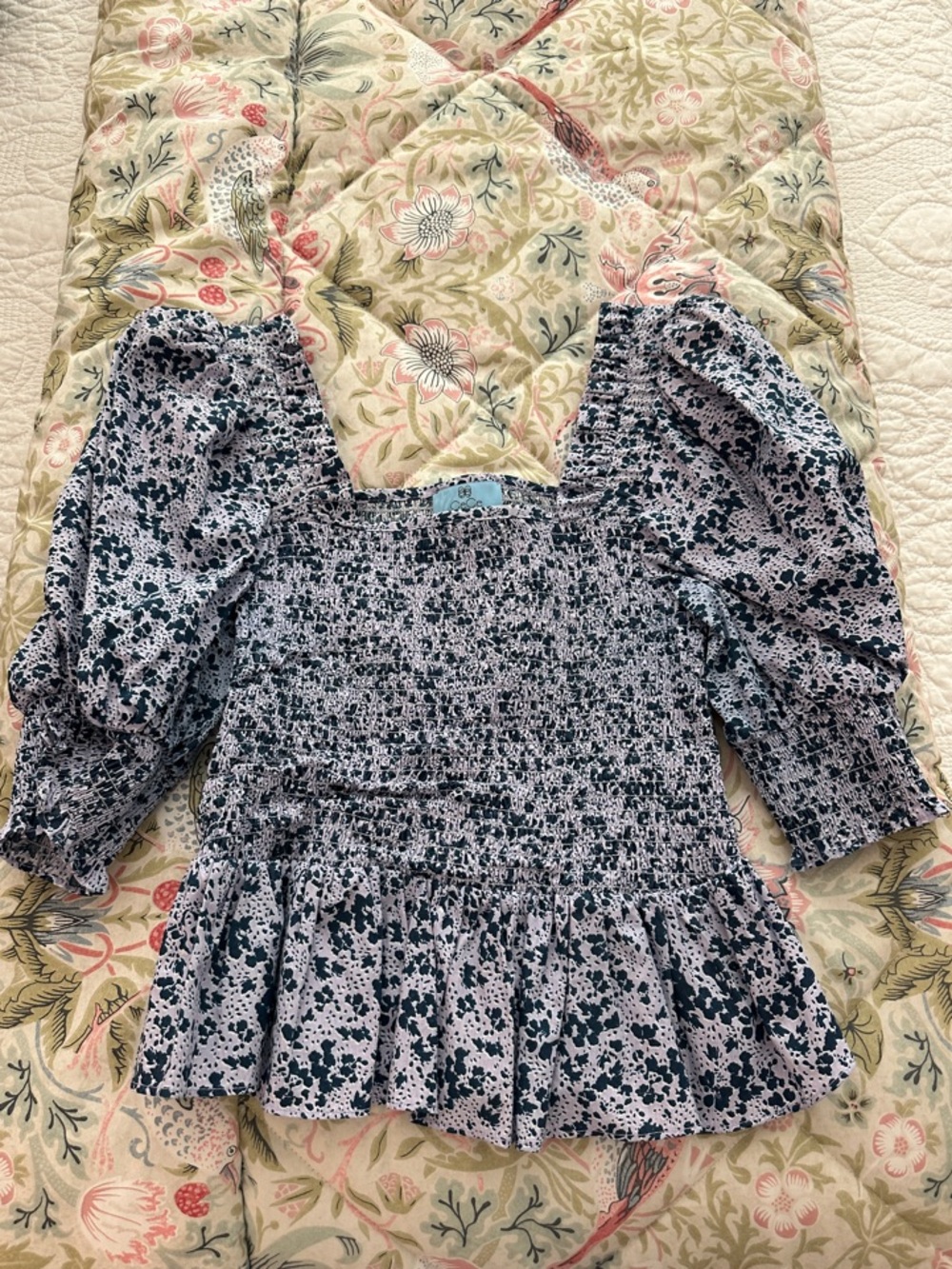 CeCe Black and White Smocked Peplum Floral Blouse